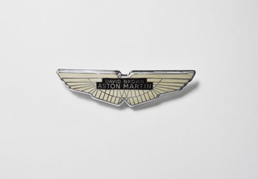 DB4 Badge Silver,New Old Stock (030-004-0035S)
